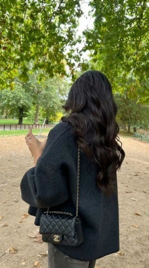 Dr. Hugi walking through a park